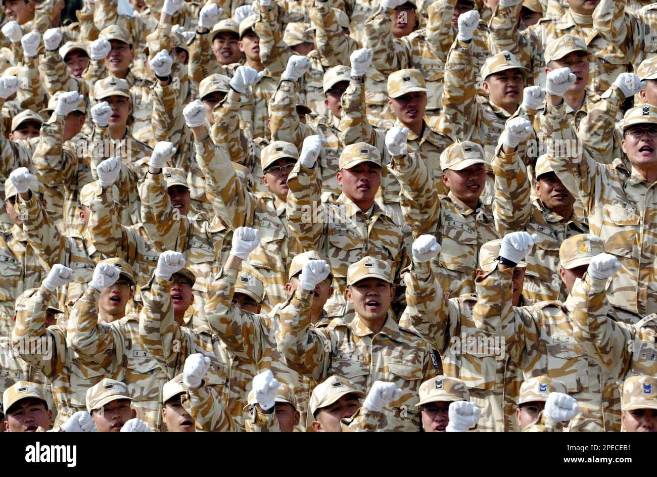 Troops Cheering South Korean troops cheer during a farewell ceremony for their dispatch ...