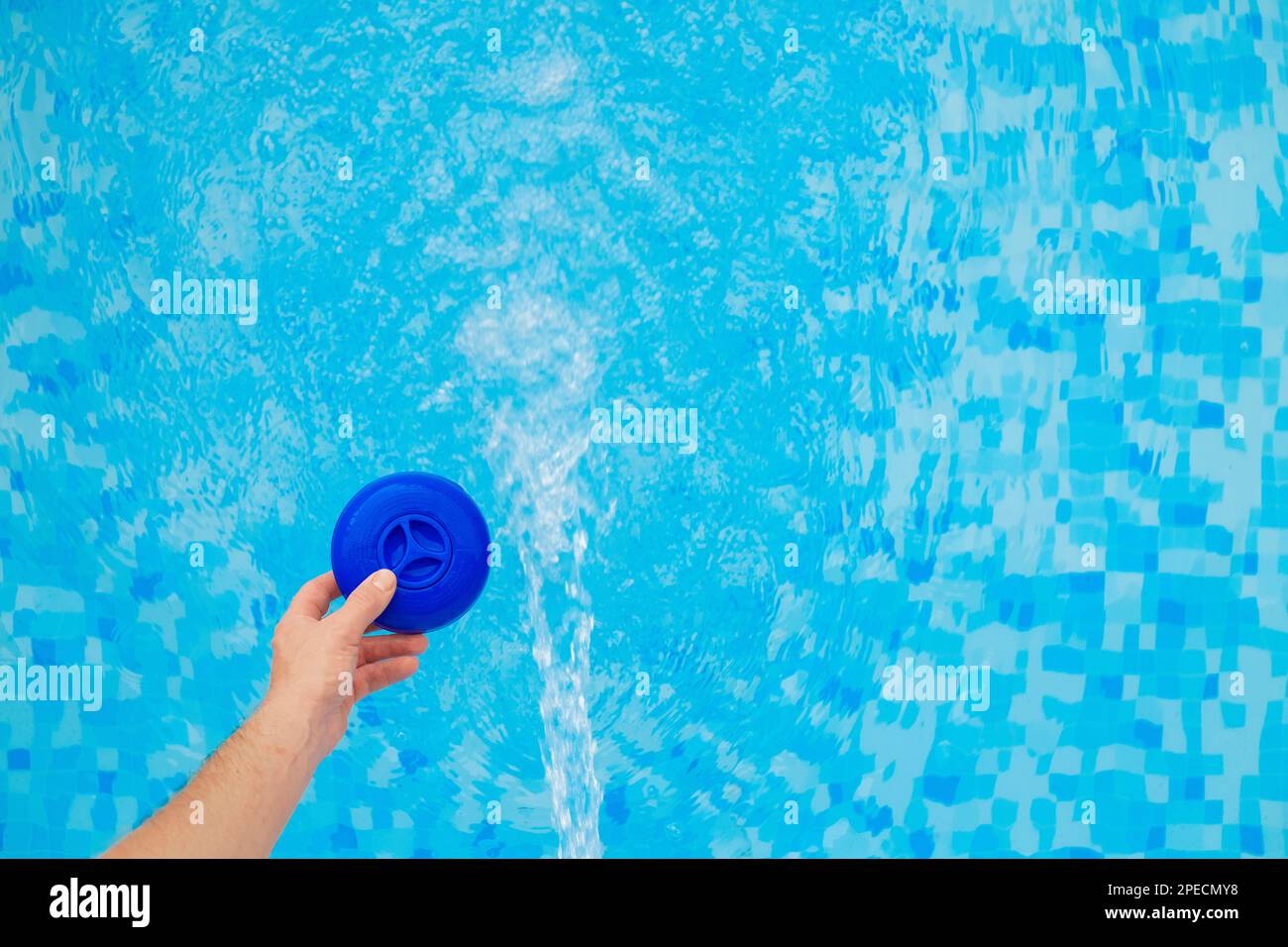 Swimming pool Filter. cleaning filter with chlorine tablets into the