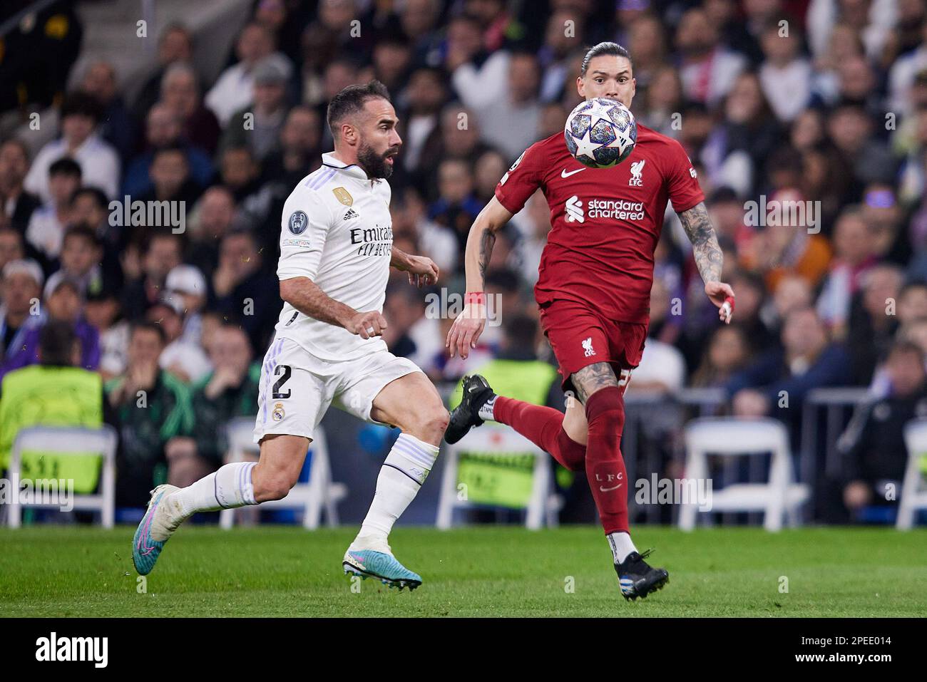 Madrid, Spain. 15th Mar, 2023. Daniel Carvajal (L) of Real Madrid and Darwin Nunez (R) of Liverpool FC in action during the UEFA Champions League, Round of 16, Second Leg between Real Madrid CF and Liverpool FC at Santiago Bernabeu Stadium. Final score; Real Madrid 1:0 Liverpool. Credit: SOPA Images Limited/Alamy Live News Stock Photo