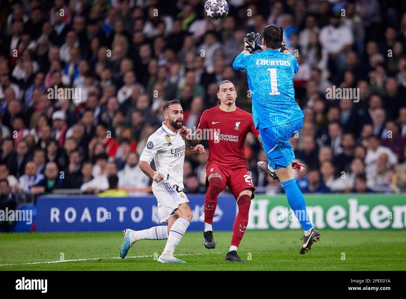 Madrid, Spain. 15th Mar, 2023. Daniel Carvajal (L) and Thibaut Courtois (R) of Real Madrid and Darwin Nunez (C) of Liverpool FC in action during the UEFA Champions League, Round of 16, Second Leg between Real Madrid CF and Liverpool FC at Santiago Bernabeu Stadium. Final score; Real Madrid 1:0 Liverpool. Credit: SOPA Images Limited/Alamy Live News Stock Photo