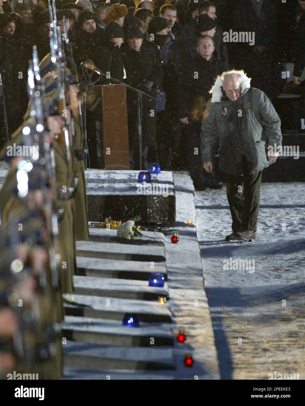 U.S. Vice President Dick Cheney bows in front of a memorial for the ...