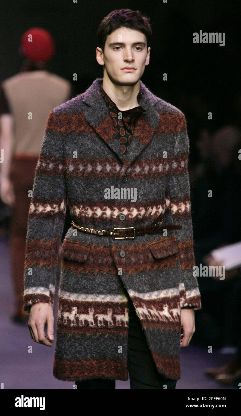 A blanket coat is shown belted at the Miu Miu Fall Winter 2005 2006 men s collection presented in Milan Italy Thursday Jan.20 2005. AP Photo Luca Bruno Stock Photo Alamy
