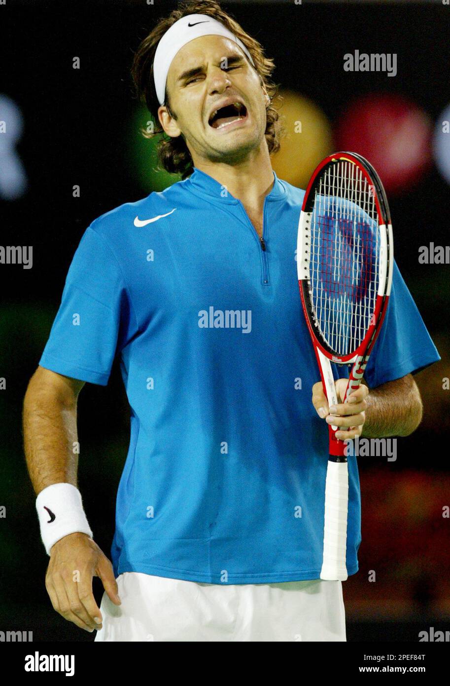 Switzerland's Roger Federer yells out during his second Switzerland's Roger Federer yells out during his second