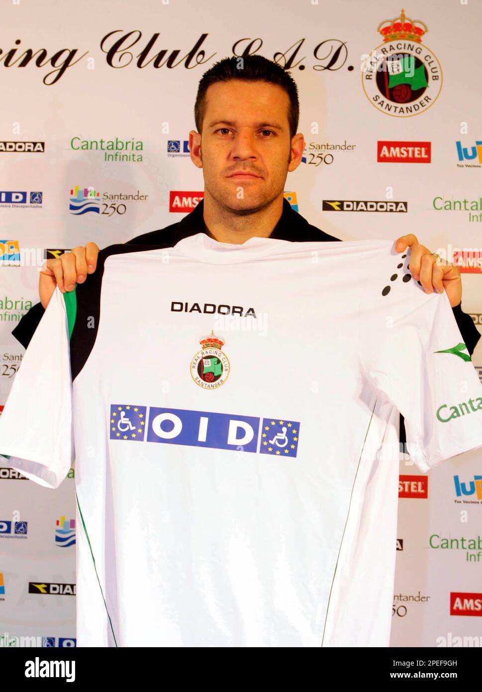 Brazilian soccer player Argel Fuks is presented to the press after signing  for Racing Santander, Spain