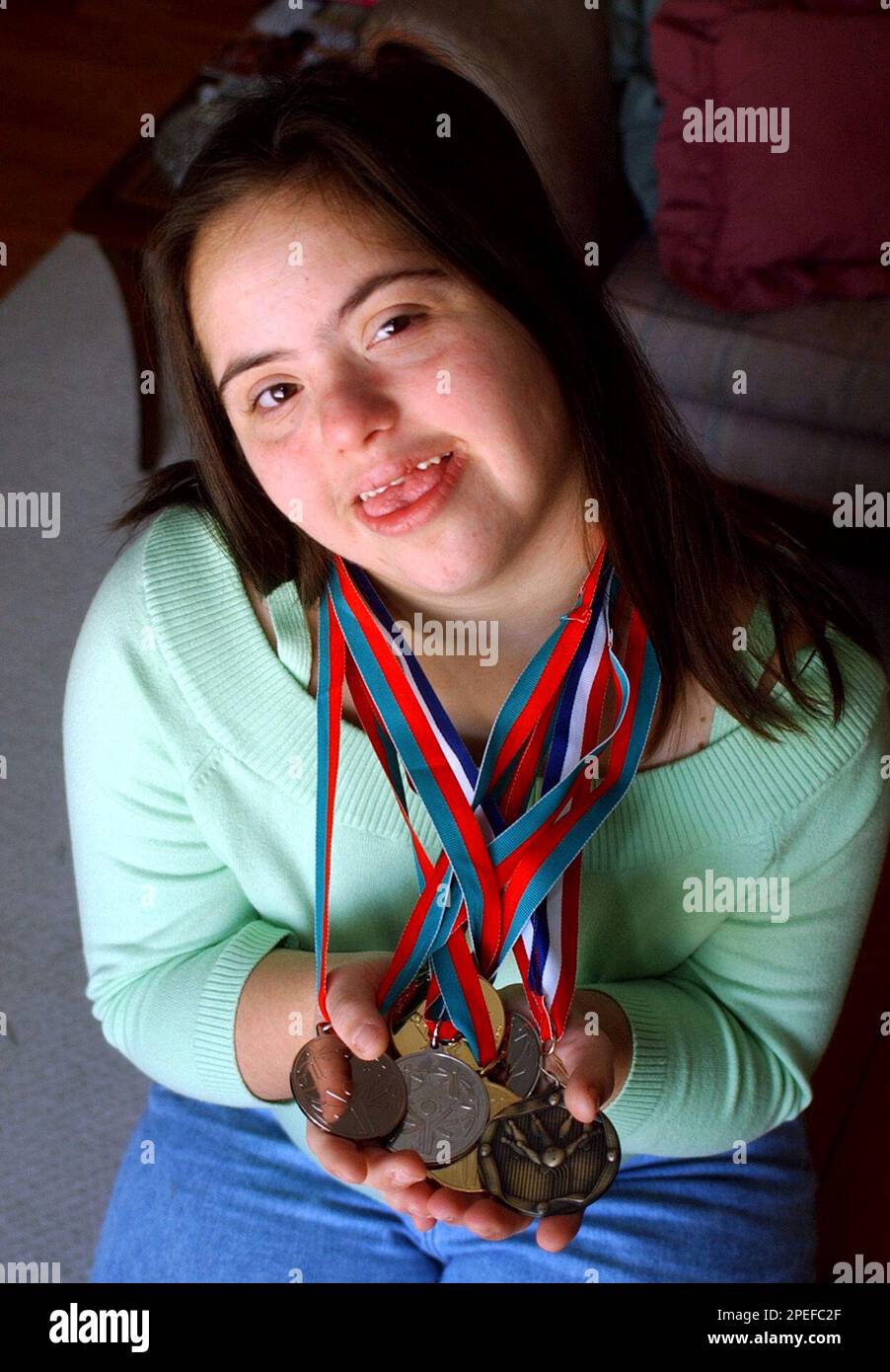 Alisa Harding, 18, of Lake Orion, Mich., displays past Special Olympics ...