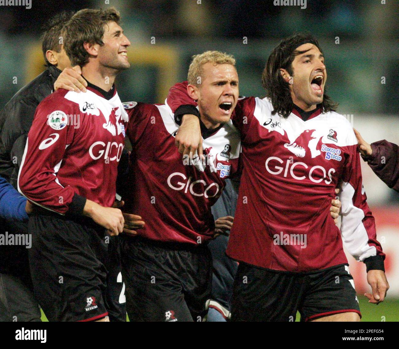 From left, Gaetano De Rosa, Santos Mozart of Brazil and Marco Balestri  celebrate at the end of the Serie A Italian top league soccer match between  Reggina and Inter, in Reggio Calabria,