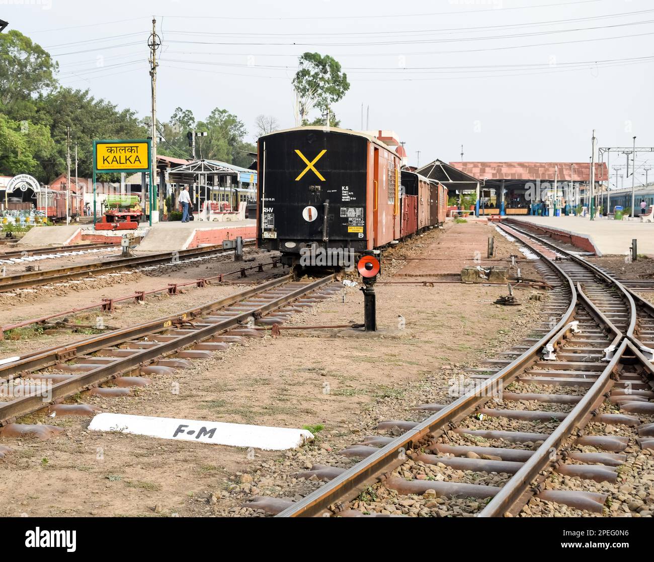 View of Toy train Railway Tracks from the middle during daytime near Kalka railway station in India, Toy train track view, Indian Railway junction, He Stock Photo