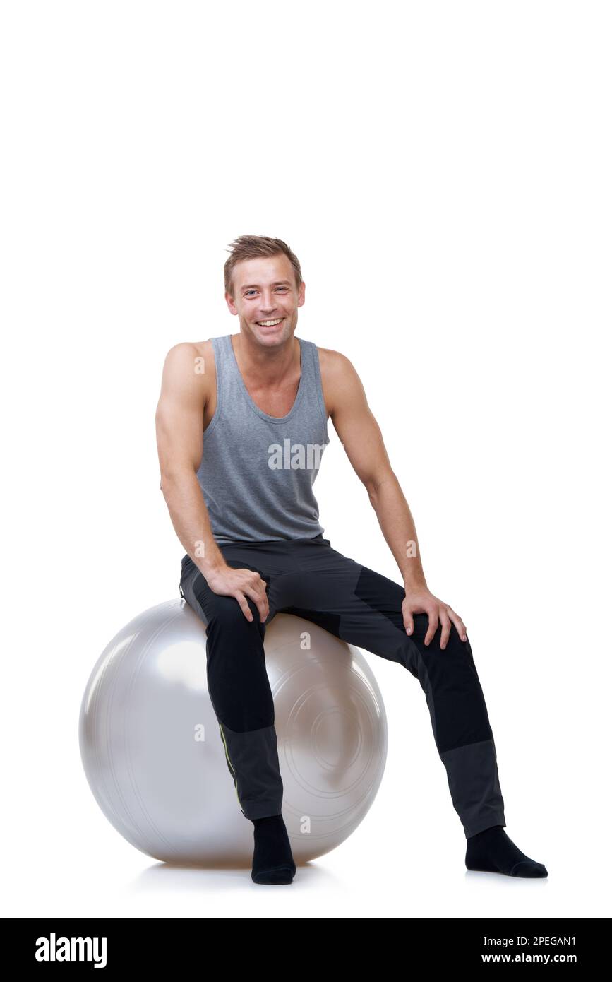 Feeling good after a heavy workout. Portrait of a smiling man sitting