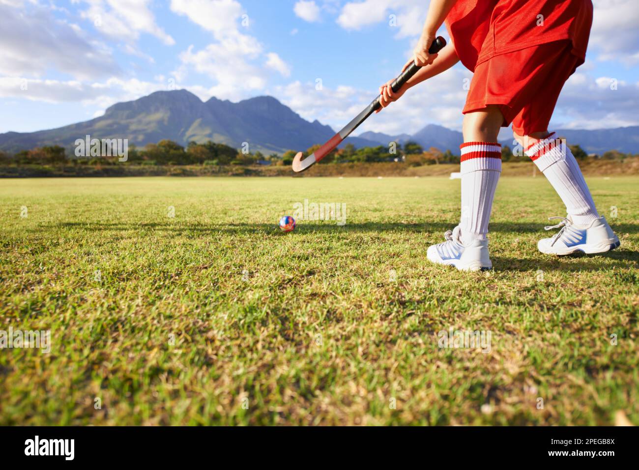 Learning how to hit the ball. Cropped image of children playing field