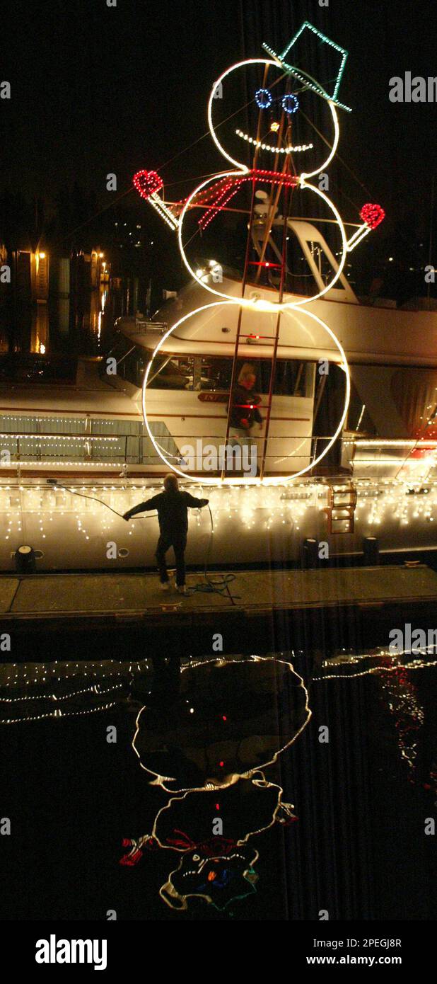Jim Chiles prepares to cast off his boat, the Intrigue from the