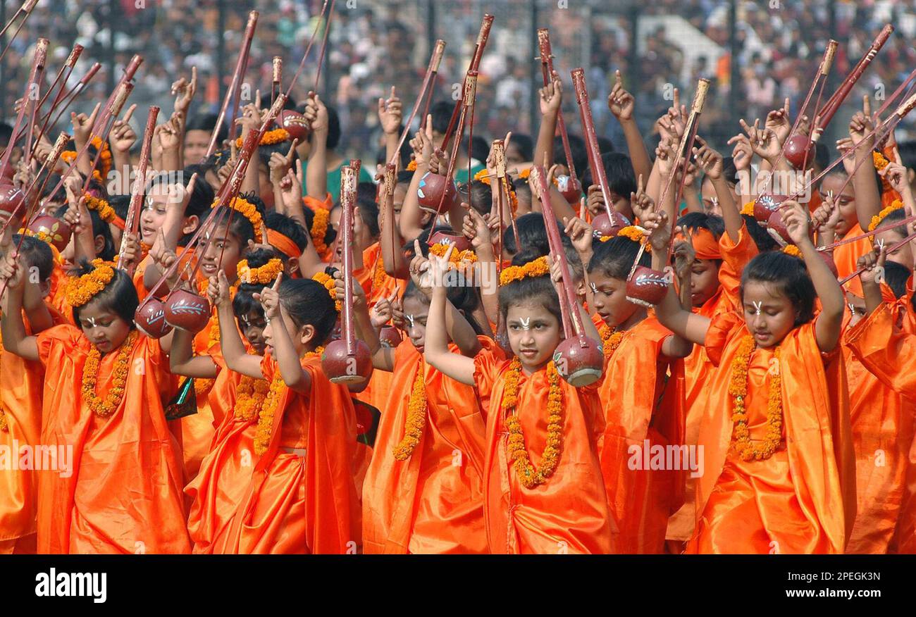 Bangladeshi girls dance during the Independence Day Parade at the Bangabandhu National Stadium in Dhaka, Bangladesh, Thursday, Dec. 16, 2004. Bangladesh held rallies, concerts and a display of military equipment Thursday to mark its triumph in the independence war against Pakistan 33 years ago. (AP Photo/Zia Islam) Stock Photo