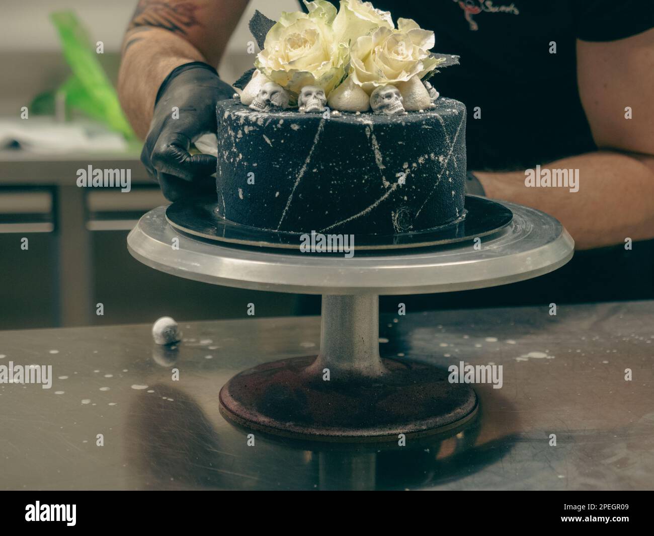 pastry chef baker topping birthday black airbrush painted frosted cake