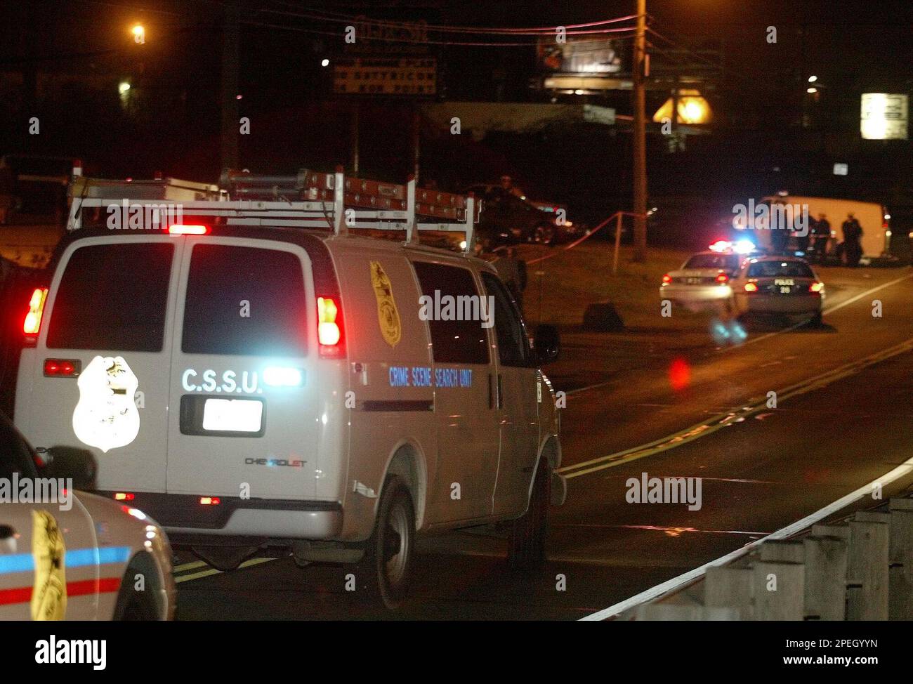 A Columbus police crime scene search unit arrives at the Alrosa Villa