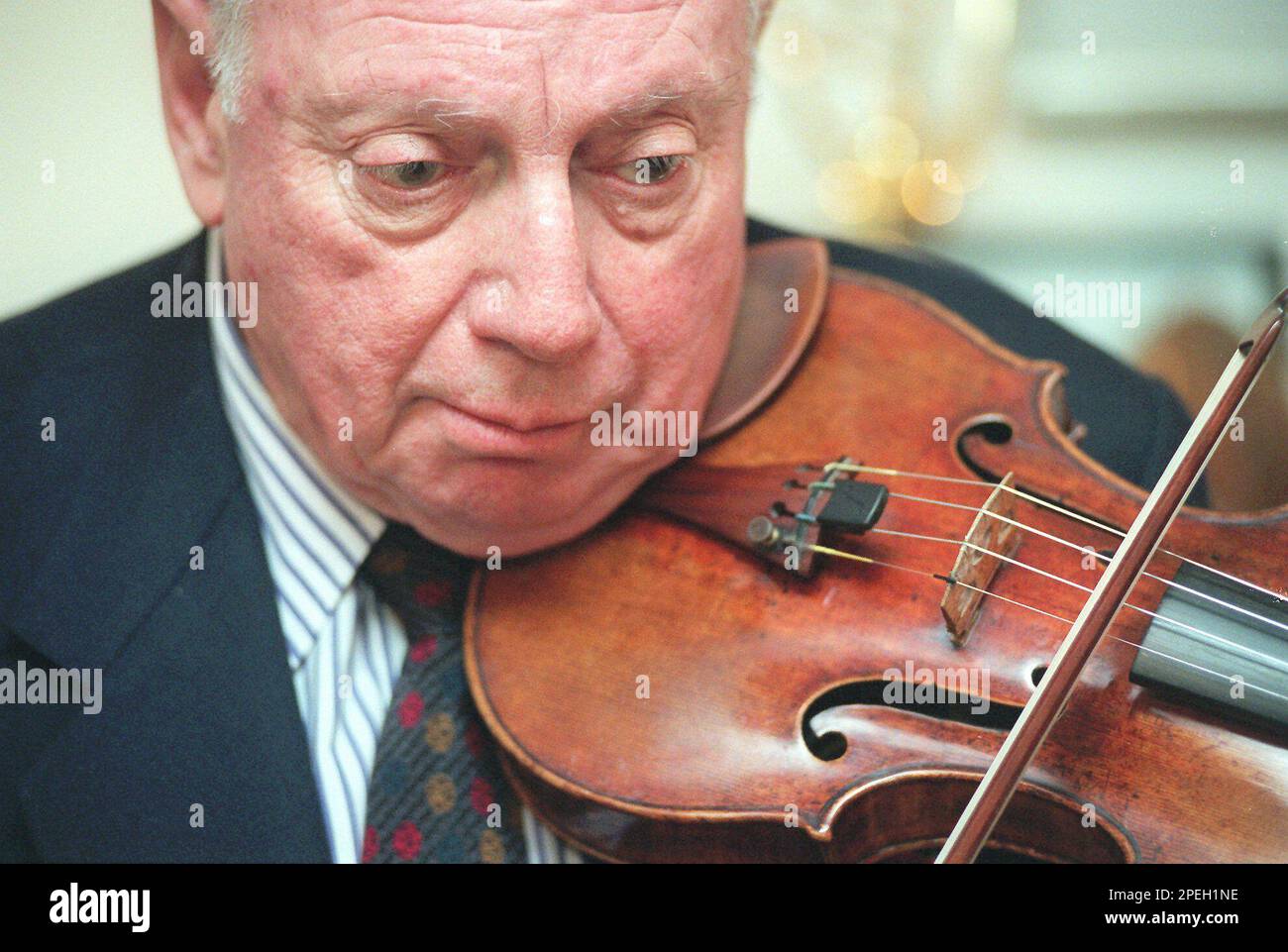 FILE *** Isaac Stern plays his violin at his studio in New York, in