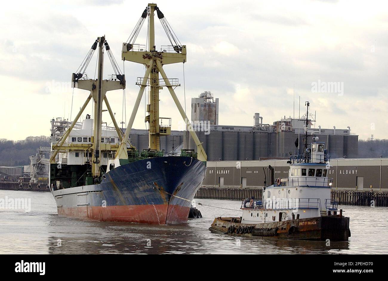 The tug Pathfinder tows the M.V. Stellamare, now renamed the Nadalina S,  from the Port of Albany, N.Y. Thursday Dec. 2, 2004 for the first time  since Dec. 9, 2003 when the