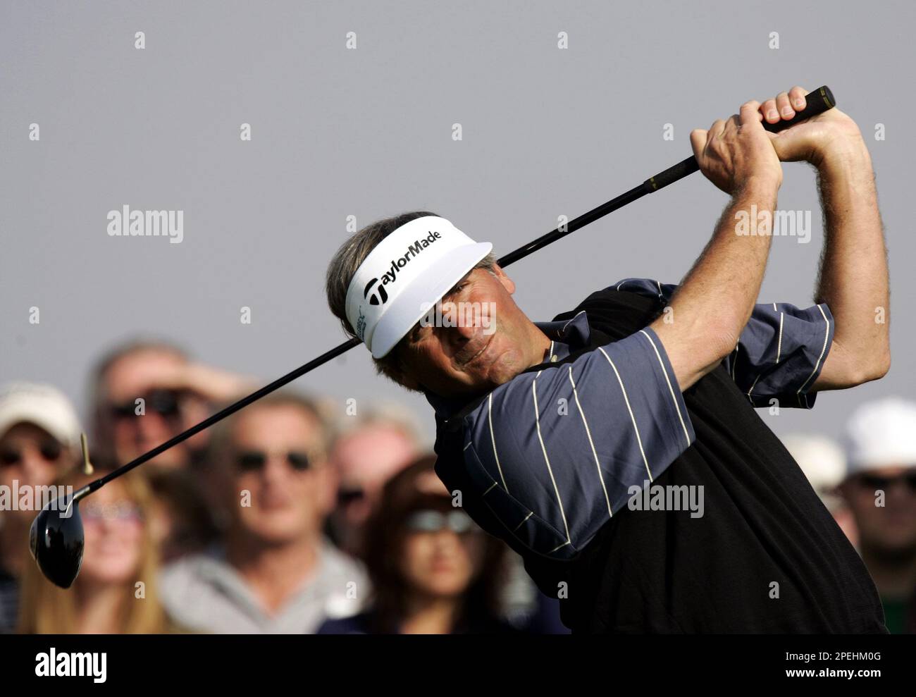 Defending champion Fred Couples watches his tee-shot from the first tee  during the first round of the Skins Game Saturday, Nov. 27, 2004, at the  Trilogy Golf Club in La Quinta, Calif. (