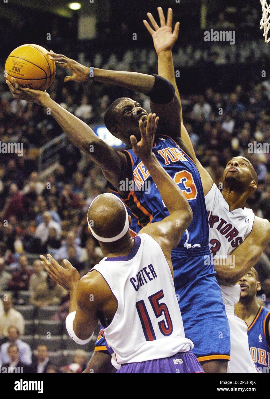 New York Knicks' Nazr Mohammed, Center, Is Double-teamed By Toronto 