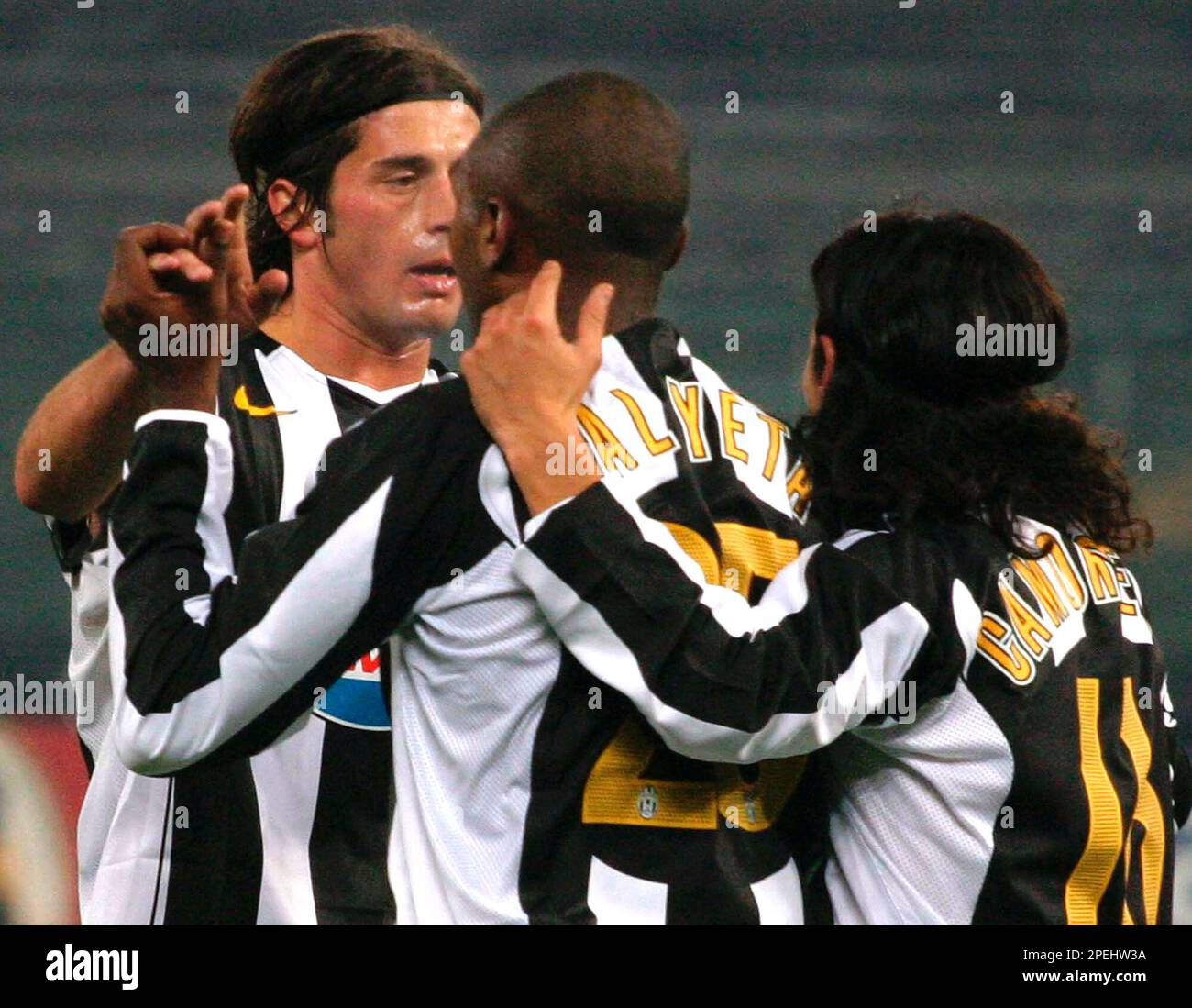 Juventus forward Marcelo Zalayeta, of Uruguay, center, jumps for the ball  as Verona's Vincenzo Italiano, left, and Marco Turati look on during an  Italian second division Serie B soccer match between Juventus