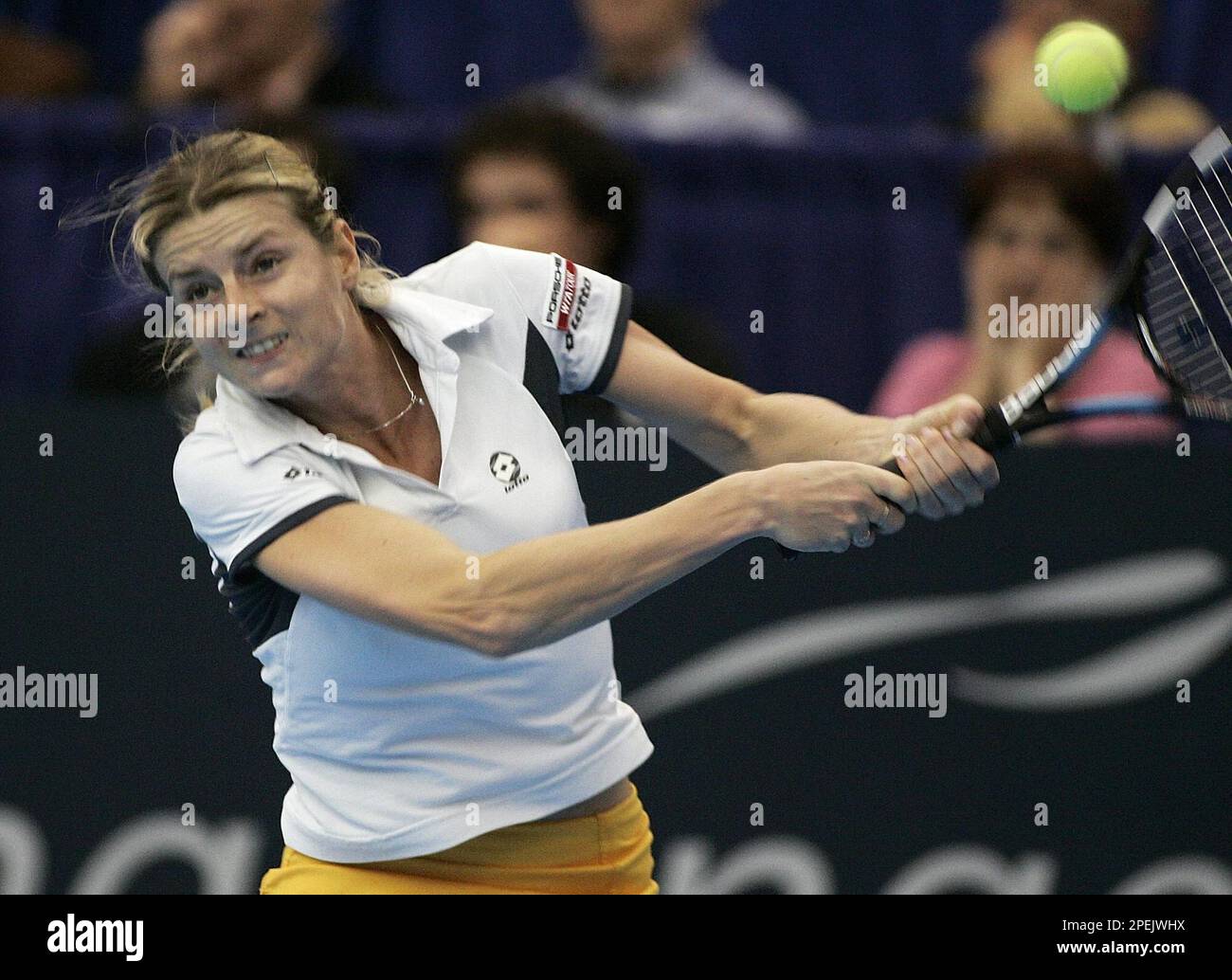 Martina Sucha of Slovakia backhands a shot to Canada's Melanie Marois during first round action Tuesday Nov. 2, 2004 at the Bell Challenge WTA tournament in Quebec City, Canada. (AP PHOTO/Jacques Boissinot) Stock Photo