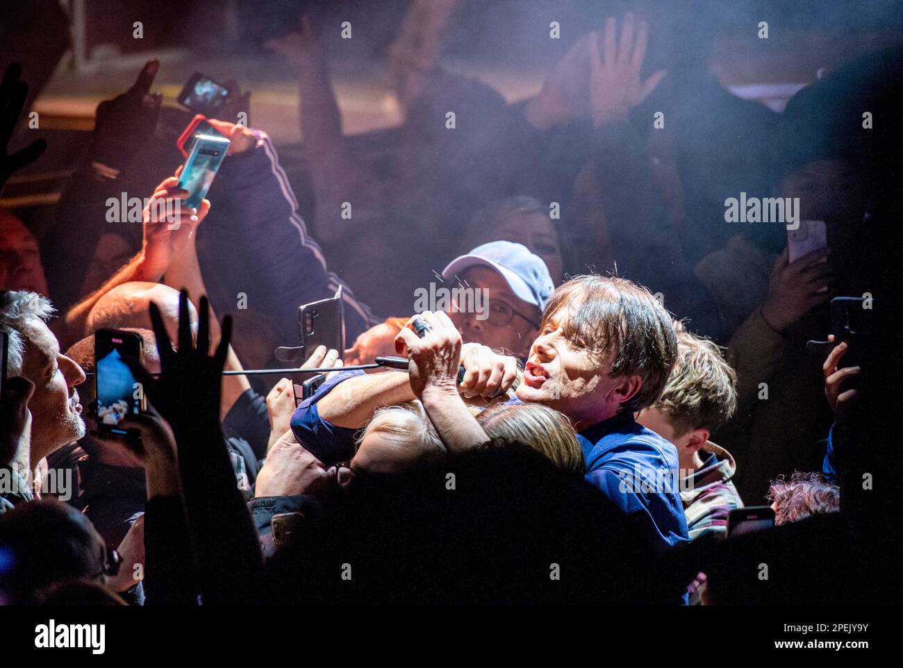 York, UK. 15th Mar, 2023. Brette Anderson, frontman of Suede, crowd-surfing while playing a live gig at The Barbican in York. Picture Credit: ernesto rogata/Alamy Live News Stock Photo