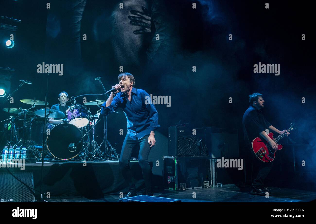 York, UK. 15th Mar, 2023. Brette Anderson, frontman of Suede, playing a live gig at The Barbican in York. In the background are drummer Simon Gilbert and guitarist Richard Oakes. Picture Credit: ernesto rogata/Alamy Live News Stock Photo