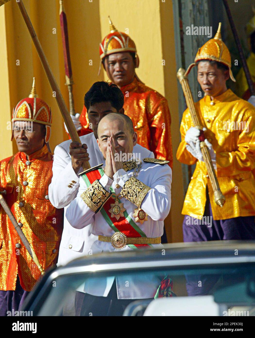 King Norodom Sihamoni greets his subjects as he leaves the Silver ...