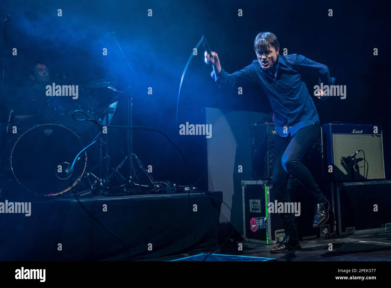 York, UK. 15th Mar, 2023. Brette Anderson, frontman of Suede, playing a live gig at The Barbican in York. In the background is drummer Simon Gilbert. Picture Credit: ernesto rogata/Alamy Live News Stock Photo