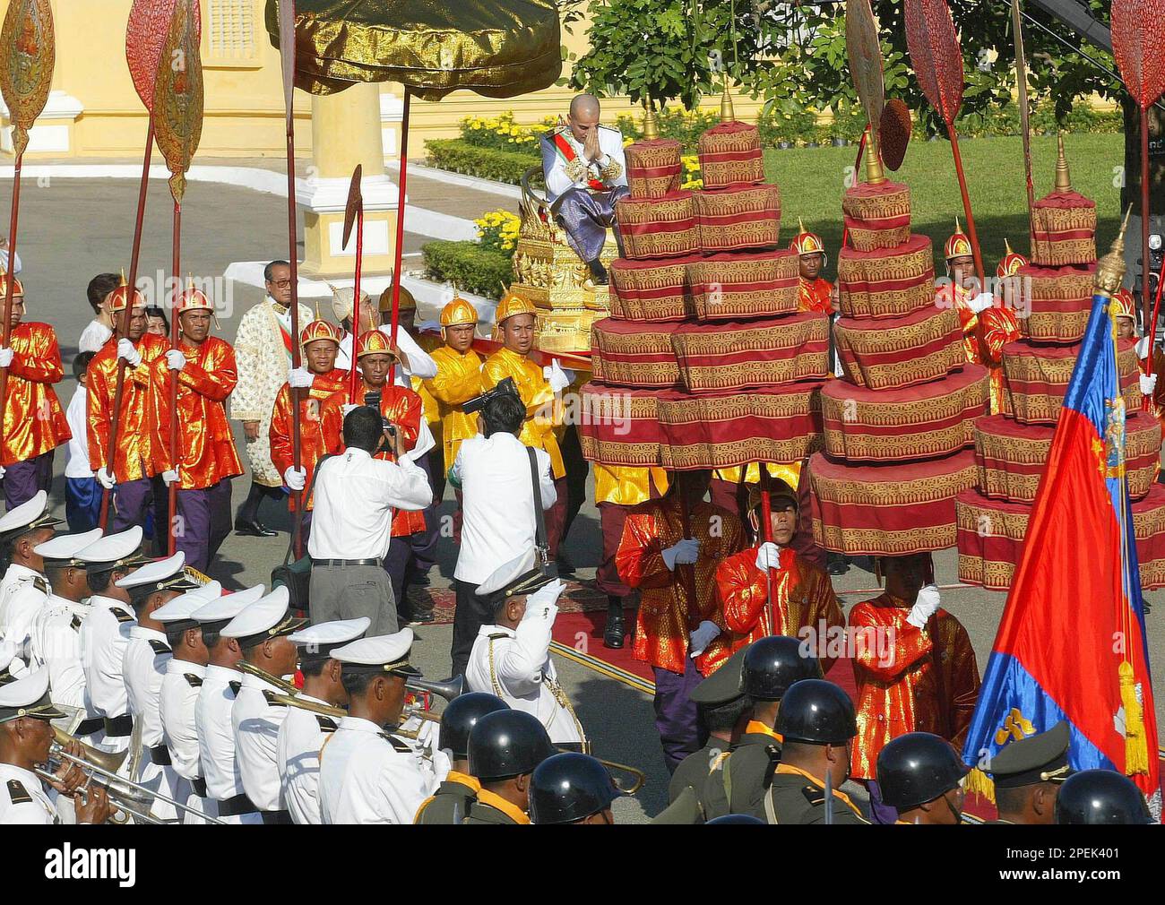 King Norodom Sihamoni is carried to the throne room at the Royal Palace ...