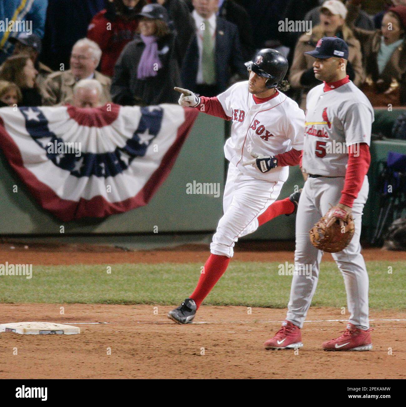 Boston Red Sox's Mark Bellhorn (12) tags out Chicago Cubs' Aramis Ramirez  (16) after he tried to strech a single into a double. The Chicago Cubs  defeated the Boston Red Sox 14-6