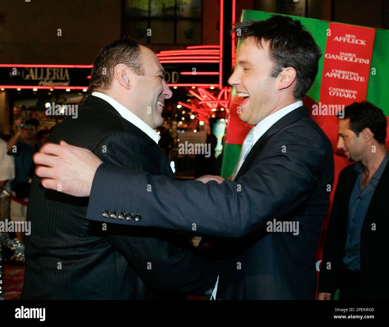 Actors James Gandolfini, left, and Ben Affleck greet each other at a