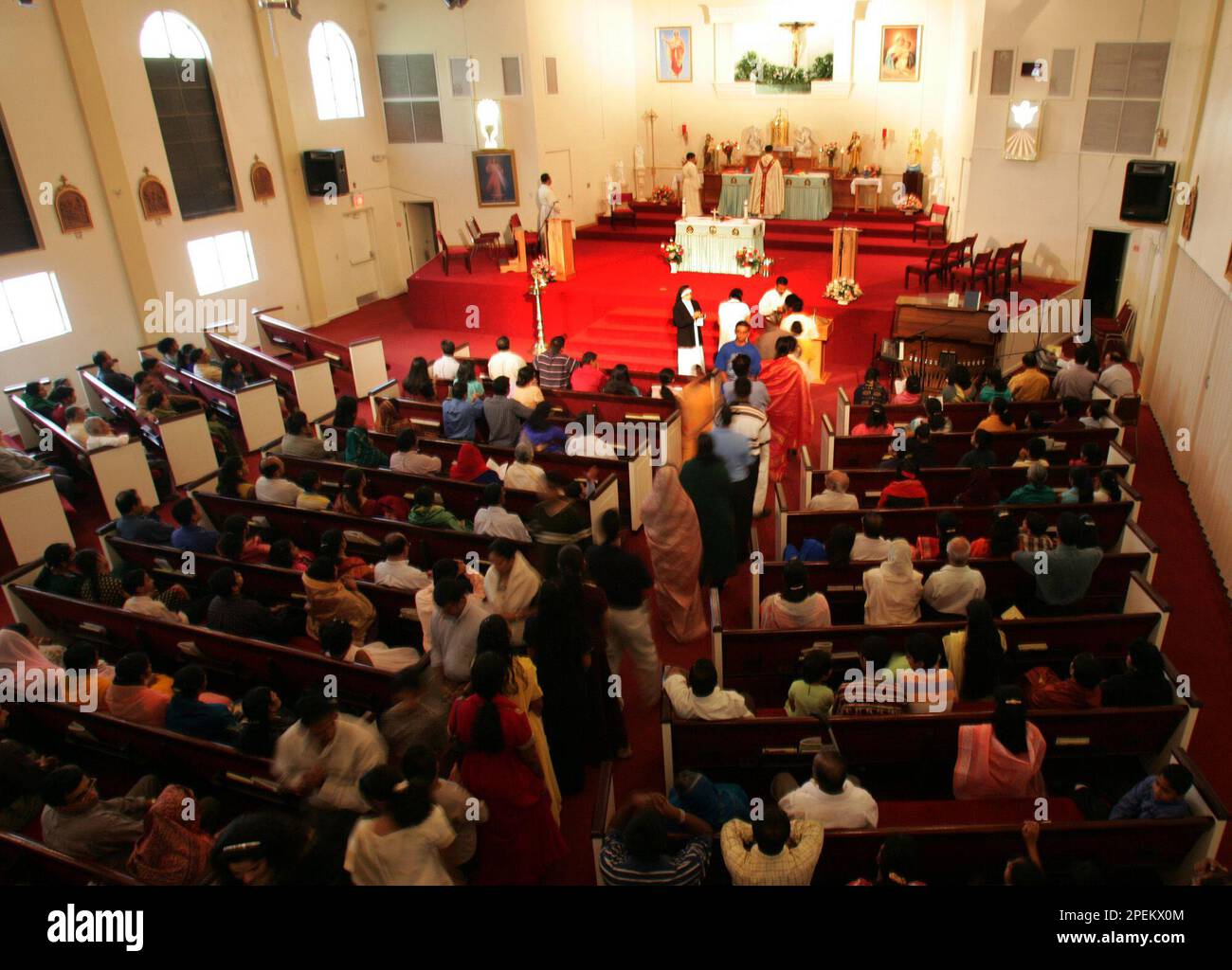 ** ADVANCE FOR THE WEEKEND OF OCT. 16 17 ** Parishioners receive communion at the First Syro