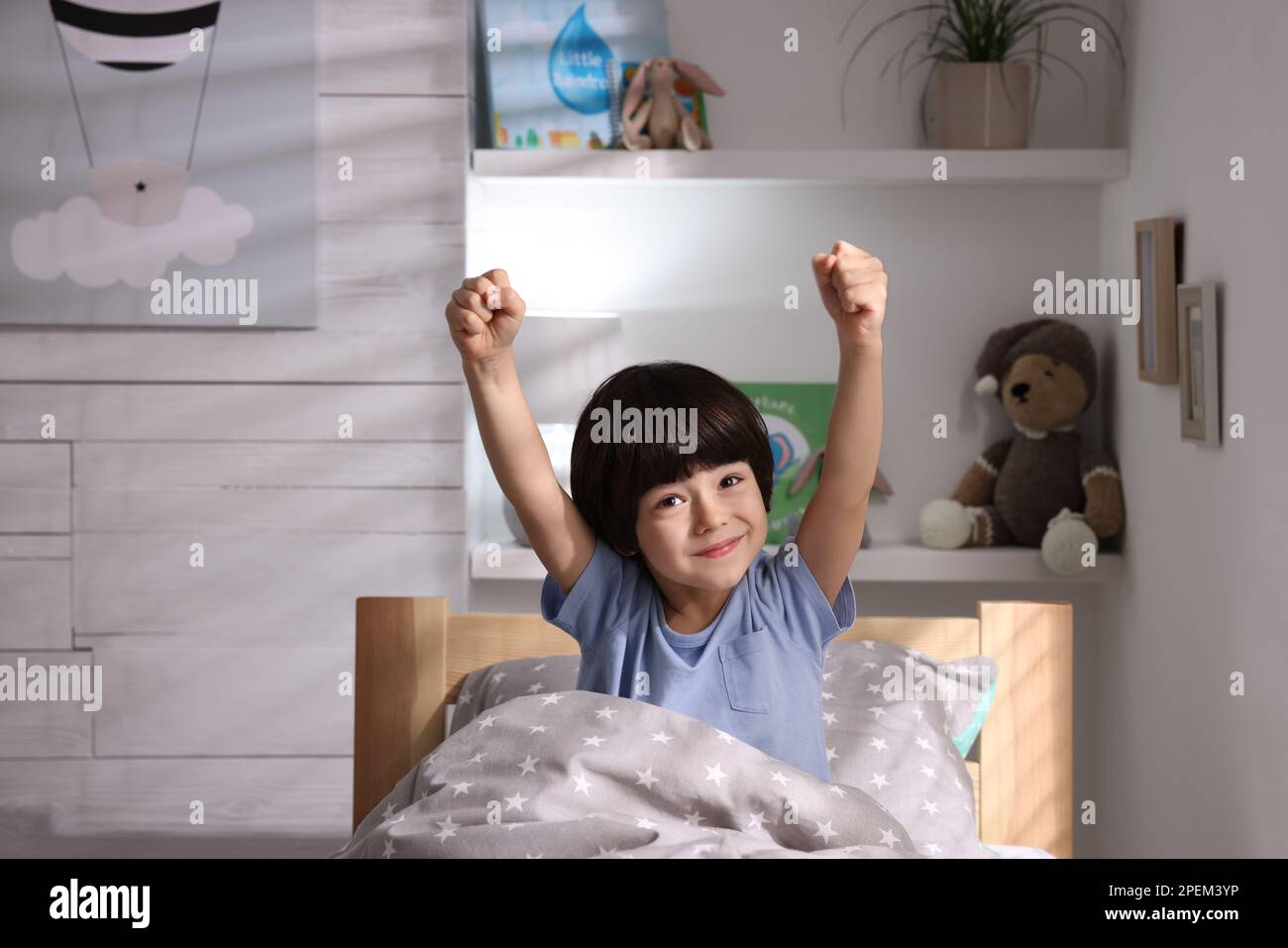 Cute little boy in bed at home Stock Photo - Alamy
