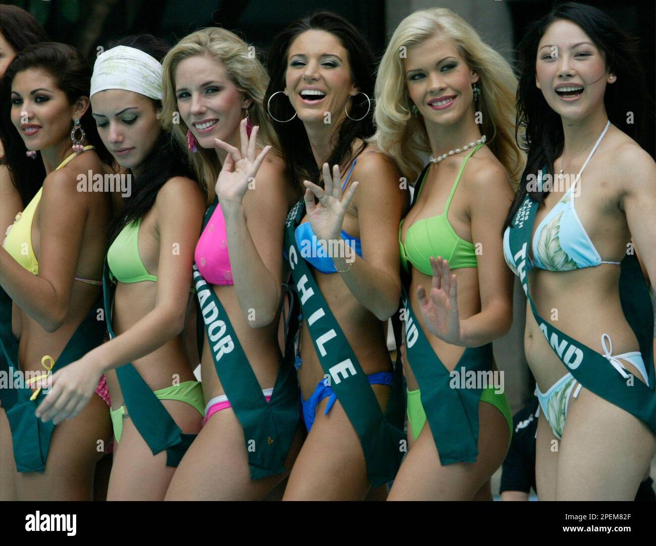 Beauty contestants for the Miss Earth 2004 pageant pose at the poolside of  a posh hotel following their presentation to the media Thursday, Oct. 7,  2004 at the financial district of Makati