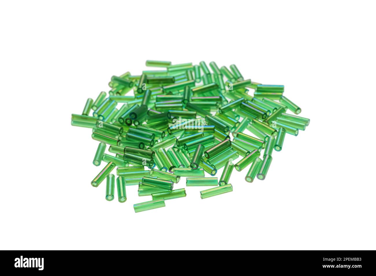 Pile of green bugle beads on white background Stock Photo Alamy