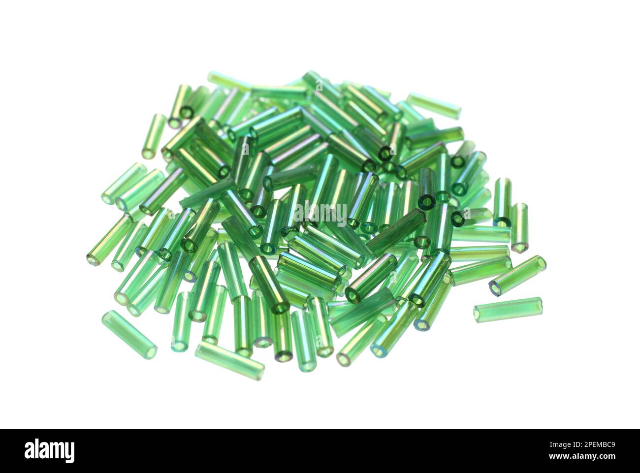 Pile of green bugle beads on white background Stock Photo Alamy