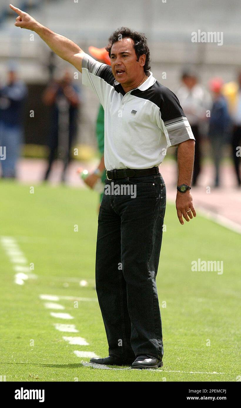 Pumas' coach Hugo Sanchez give instructions to his players during a game  against Dorados at the University stadium in Mexico City, Mexico, Sunday  Oct. 3, 2004, during their Mexican first division game.