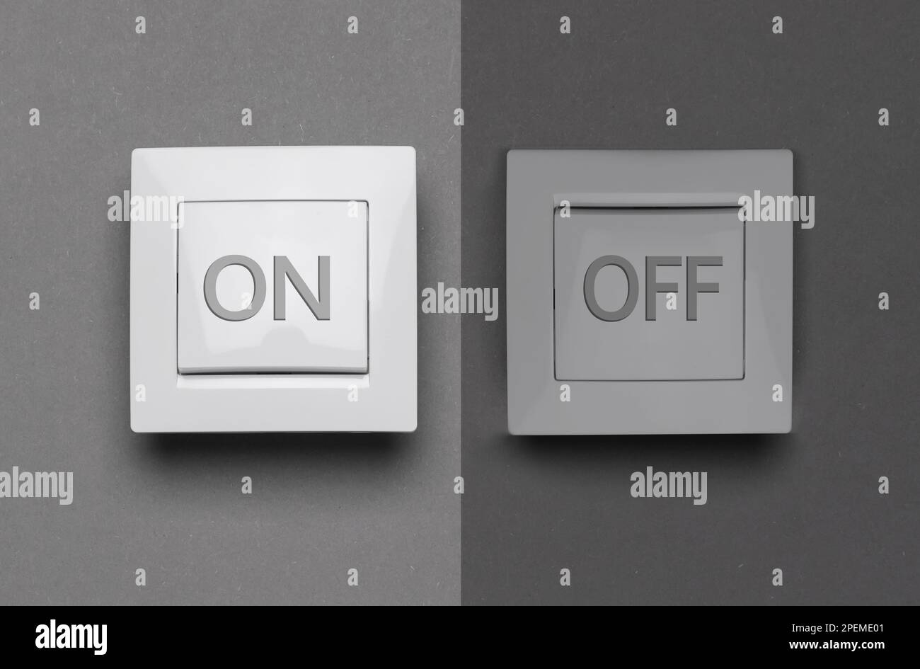 Turned ON and OFF light switches on grey background Stock Photo Alamy