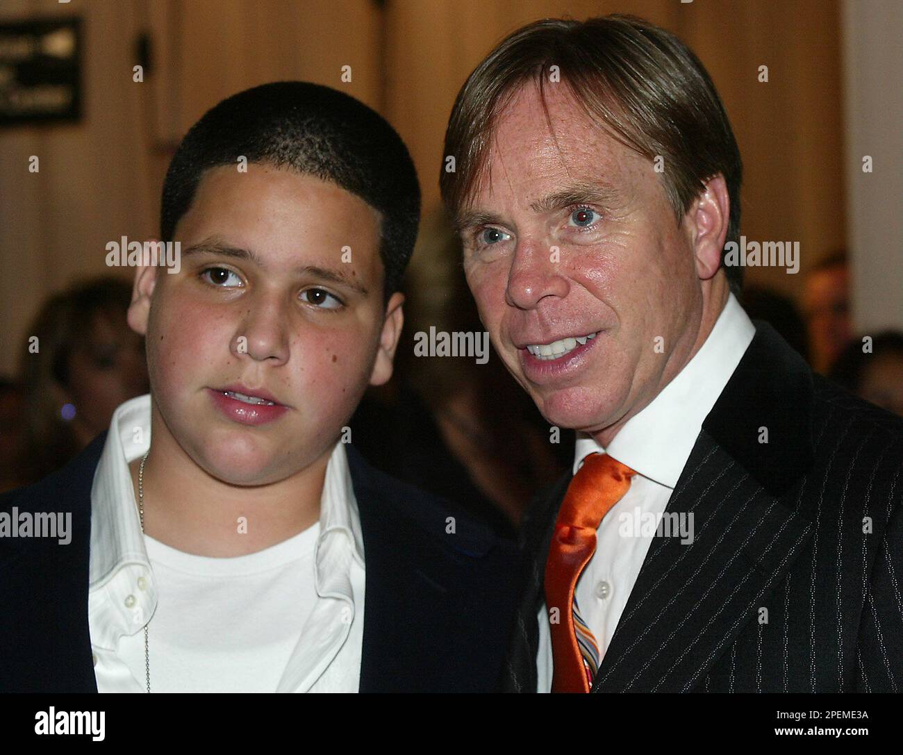 Designer Tommy Hilfiger, right, and his son, Richard, arrive at 