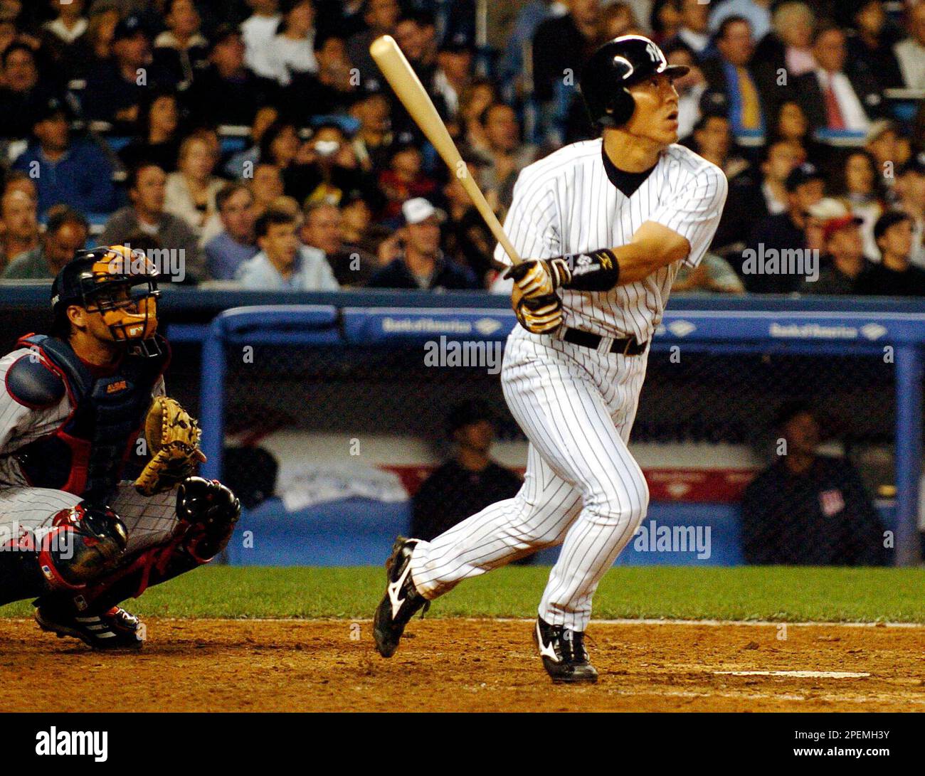 New York Yankees' Hideki Matsui watches his solo home run in the seventh  inning against the Minnesota Twins, Thursday, Sept. 30, 2004, in New York.  The Yankees defeated the Twins, 6-4, to