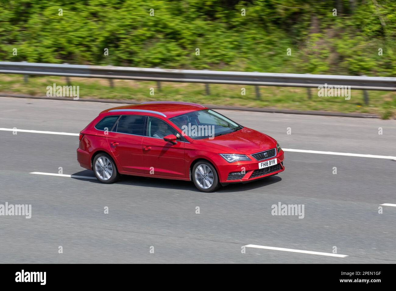 2018 Red SEAT Leon Technology Xcellence travelling on the M6 motorway, UK Stock Photo