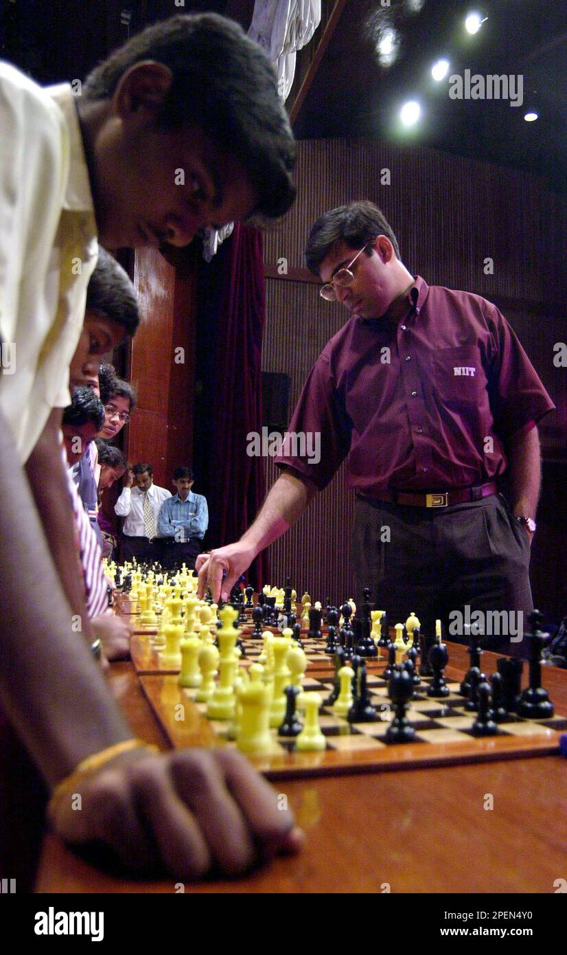 Indian World Rapid Chess Champion Viswanathan Anand, right, plays against  children at the launch of a school chess tournament organized by the NIIT  Mind Champion's Academy in Bangalore, India, Monday, Sept. 20