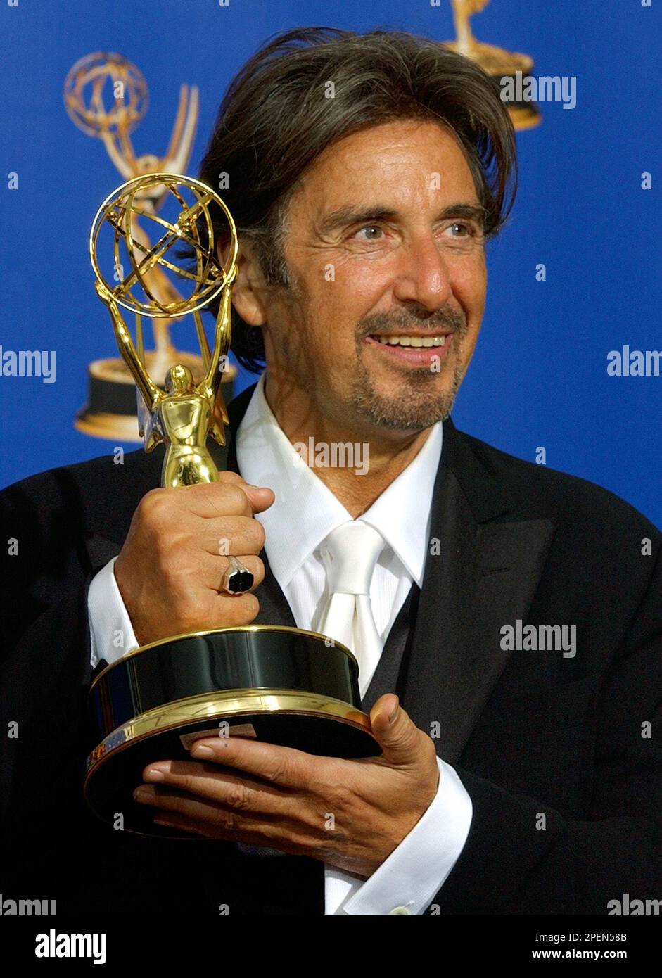 Al Pacino poses with his trophy for outstanding lead actor in a