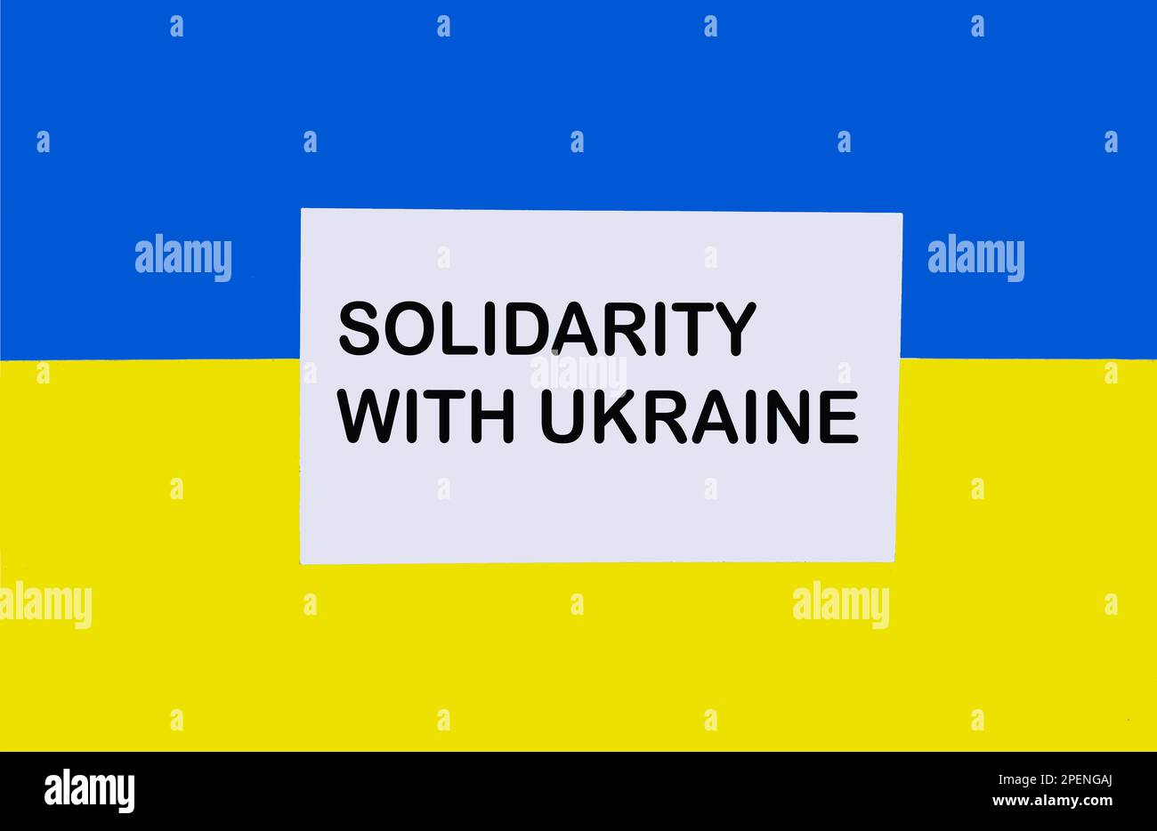 Solidarity with Ukraine Background with the Ukrainian flag. The concept of patriotism and unity. Stock Photo