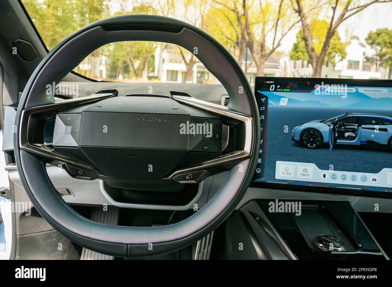 The steering wheel and infotainment screen of the HiPhi Z, an electric