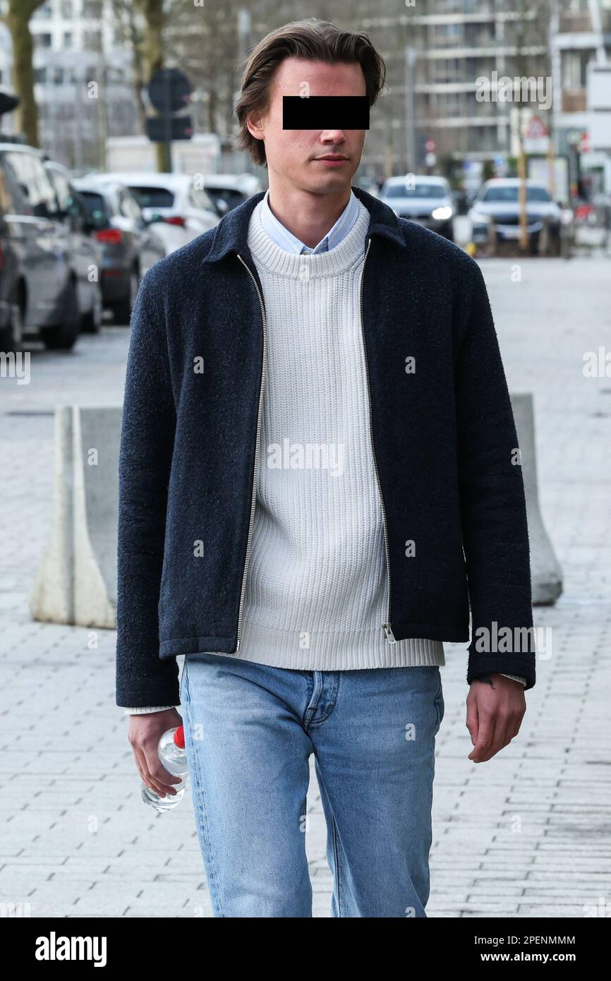 One of the accused arrives for a session of the case before the Antwerp