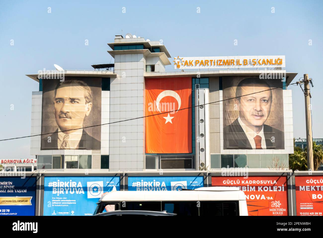 Recep Tayyip Erdoğan presidential campaign ahead of elections . Erdogan next to Ataturk banner portraits, AK Party headquarters in Izmir, Turkey Stock Photo