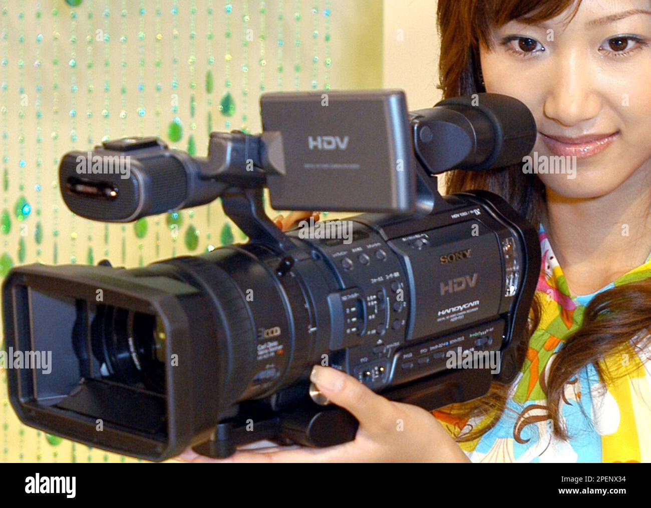 A model displays Sony Corp's new digital high definition video