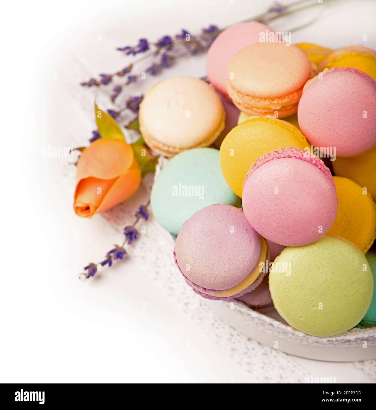 Colorful macaroons in a gift box on a white table Stock Photo