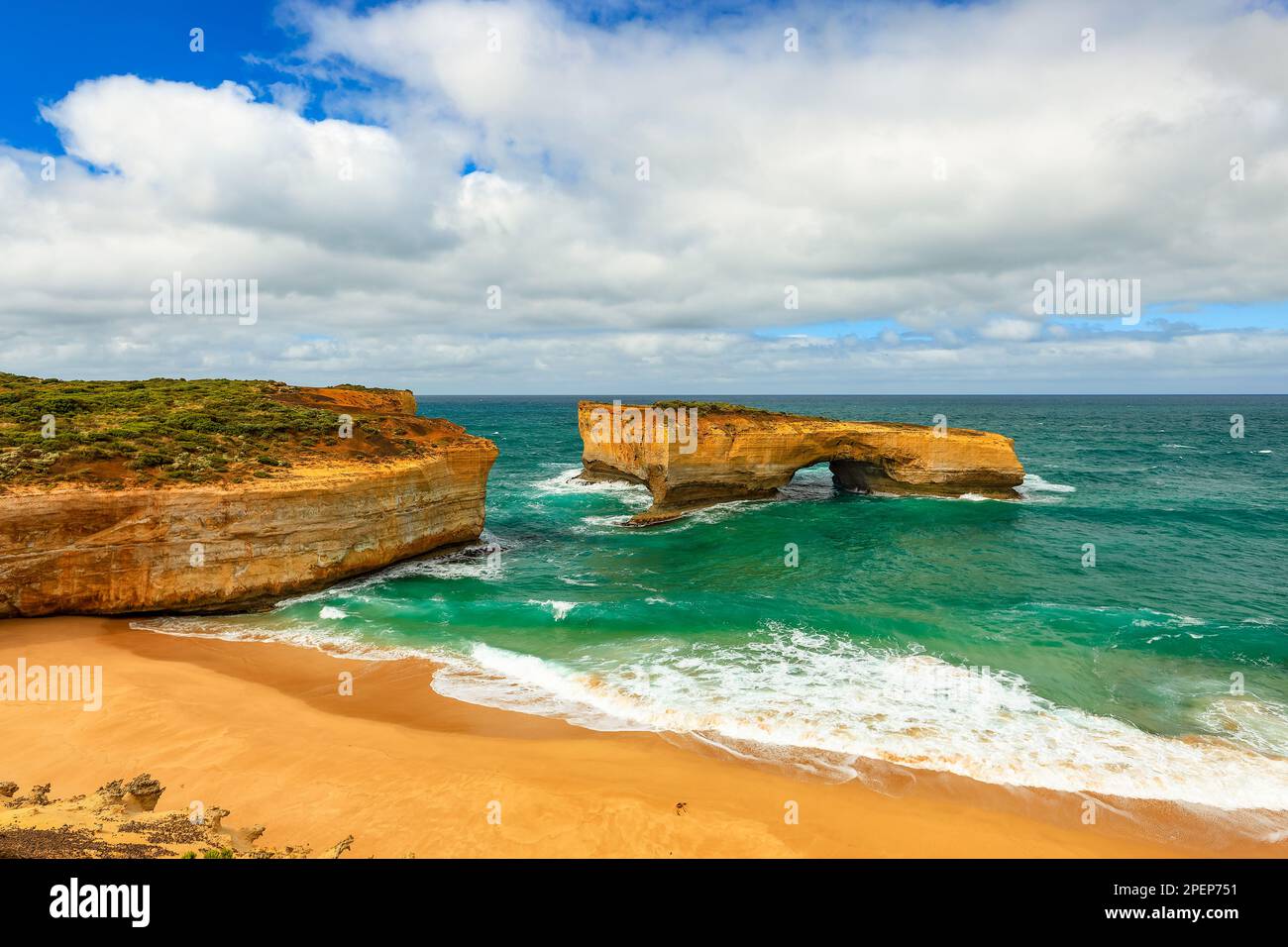 Sea view London Arch remains of formerly known as London Bridge a natural arch in the Port Campbell National Park, Victoria Australia with teal sparkl Stock Photo