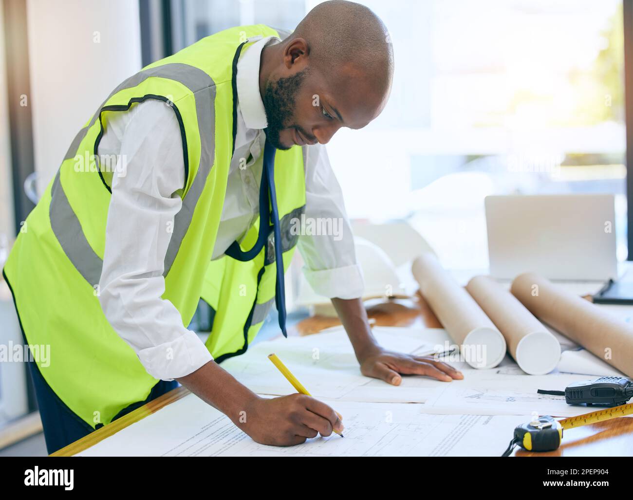 Architect, blueprint and man writing in office on paper, design and ...